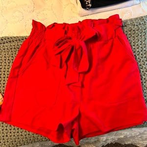 Red high waist paper bag shorts. Size medium